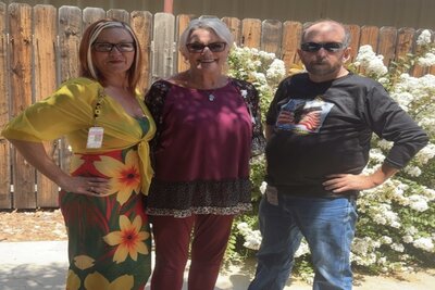 Group picture of two females and a male. LTC activities department staff.